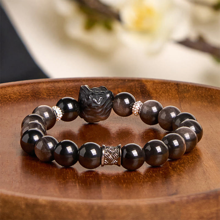 Buddha Stones Armband van obsidiaan met natuurlijke zilverglans en leeuwendans - image 3