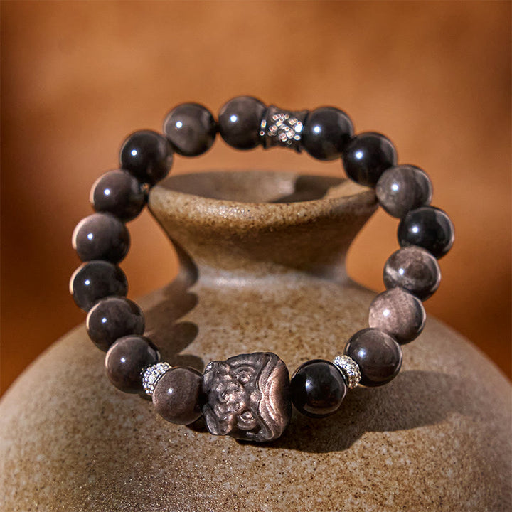 Buddha Stones Armband van obsidiaan met natuurlijke zilverglans en leeuwendans - image 1