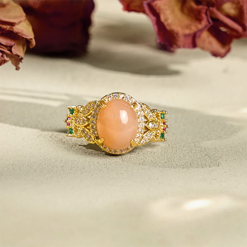 Buddha Stones Vintage Ring met vierbladig bloemmotief en perzikkleurige maansteen, verstelbaar en rustgevend. - image 1