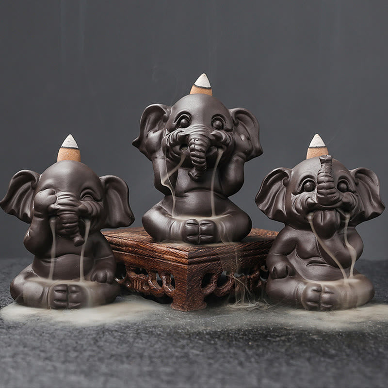 Buddha Stones Schattige olifant van paarse klei met rookfontein en terugstroomfunctie, geschikt als Wierook voor vredesbevordering. - image 1