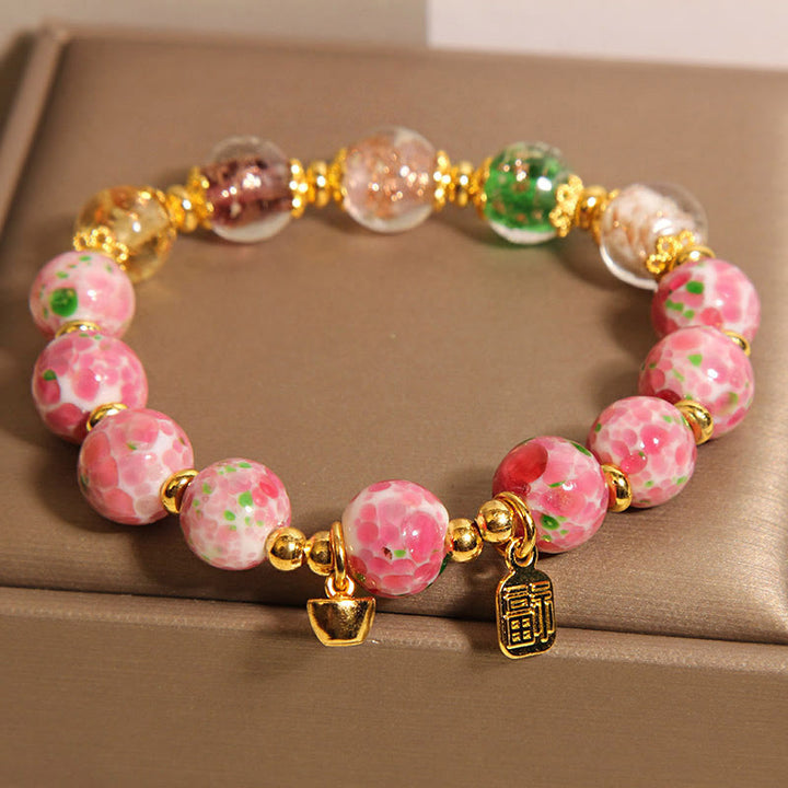 Buddha Stones Roze Liuli Armband met Fu-figuurtje - image 2