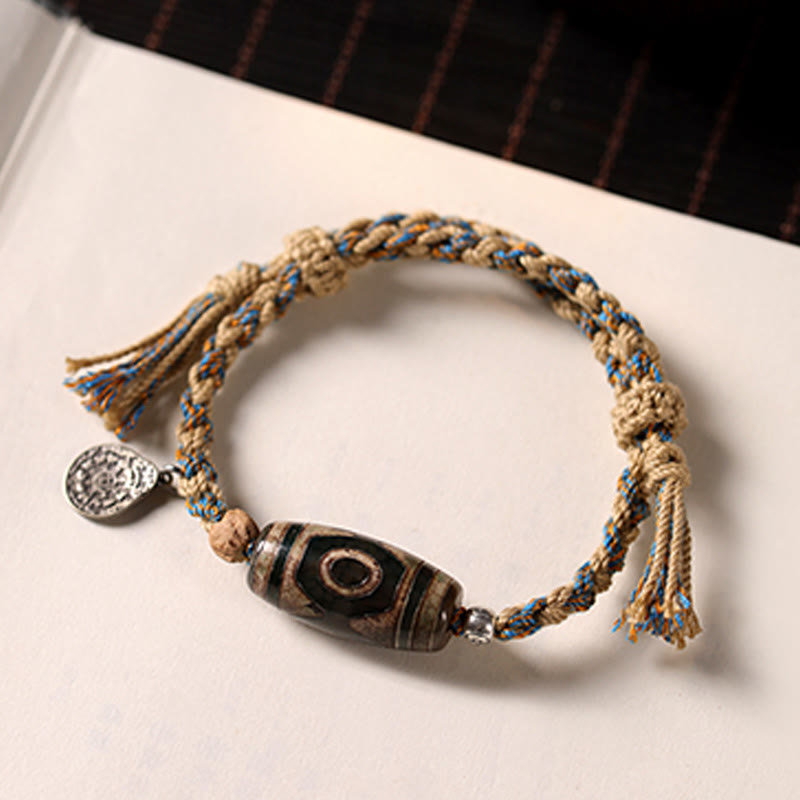 Buddha Stones Handgemaakte Tibetaanse Dzi-kralen Armband met gevlochten koord voor bescherming van rijkdom. - image 1