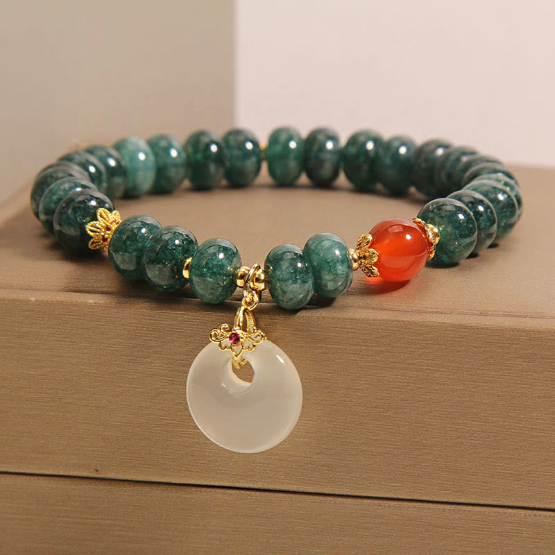 Buddha Stones Vredesgesp/ Armband met blauwe jade kralen - image 1