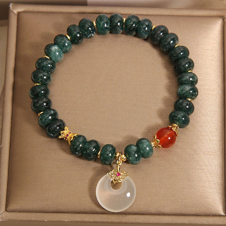 Buddha Stones Vredesgesp/ Armband met blauwe jade kralen - image 8