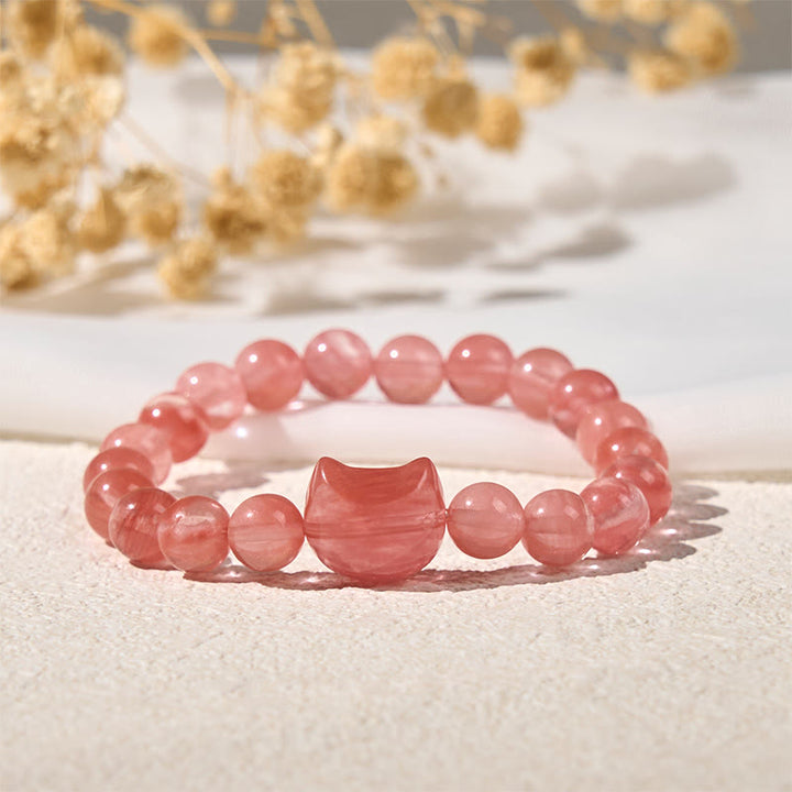 Buddha Stones Mooie Armband met rode agaat kralen in de vorm van een kattenkop. - image 1