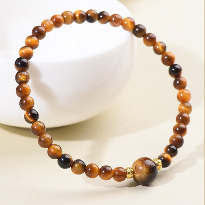 Buddha Stones Armband met kralen van tijgeroog en zwarte obsidiaan, symbool voor moed. - image 3