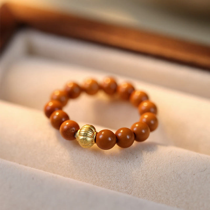 Buddha Stones Olijfpitkraal Koperen Munt Binnenste Ring - image 13