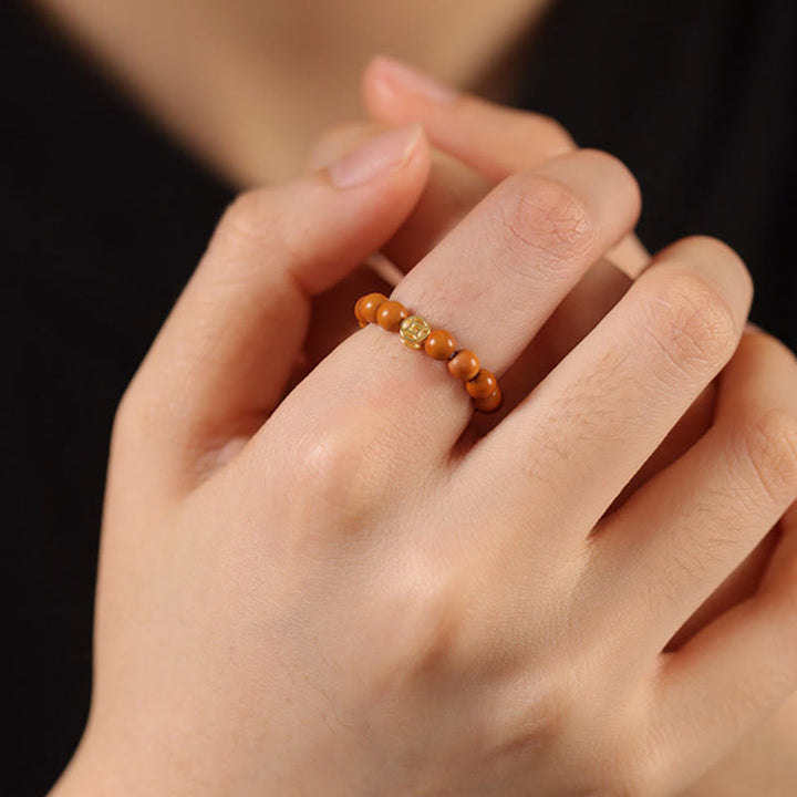 Buddha Stones Olijfpitkraal Koperen Munt Binnenste Ring - image 16