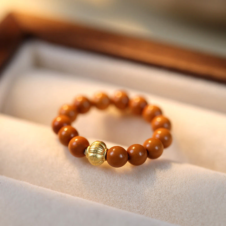 Buddha Stones Olijfpitkraal Koperen Munt Binnenste Ring - image 15