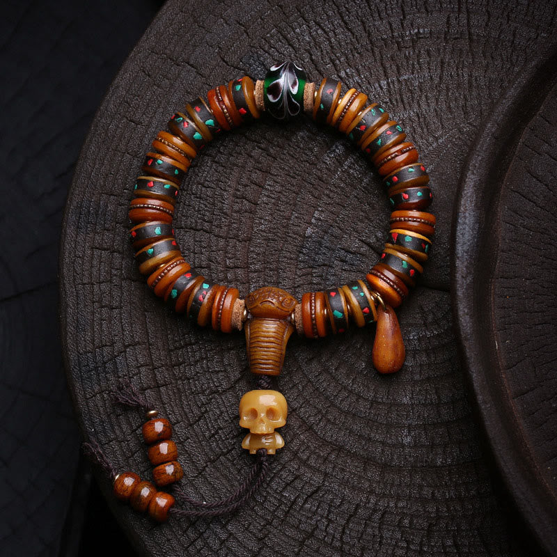 Buddha Stones Tibetaanse bottenkralen De Heer van het Lijkenbos Herinnering aan onze Vergankelijkheid Armband - Doodskophanger (Polsomtrek: 16-17 cm) - image 0