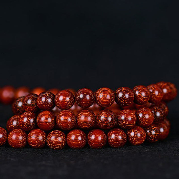 Buddha Stones Tibetaanse Armband met kleine rode sandelhouten blaadjes - 5mm*108 - image 12