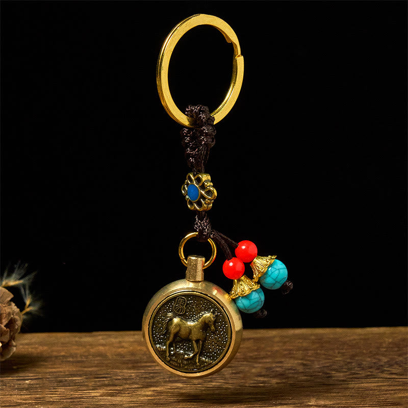 Buddha Stones Sleutelhanger van messing met het thema Jaar van het Paard: Brengt rijkdom en schatten - image 1