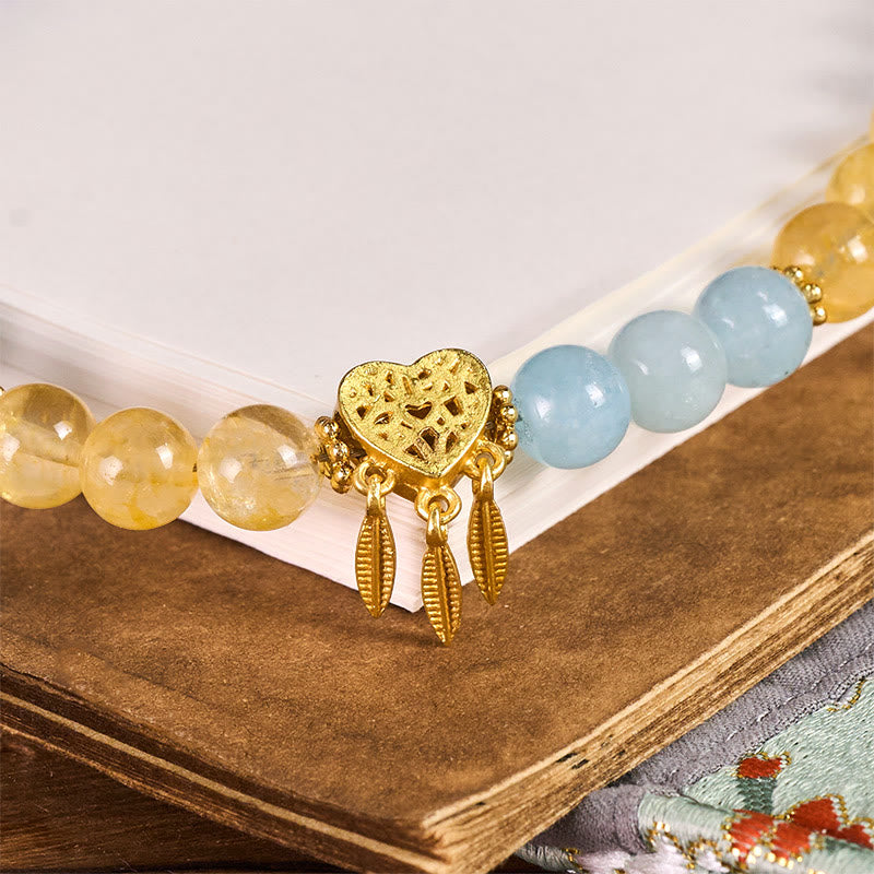 Buddha Stones Sleutelhanger met hartvormig ontwerp van blauwe chalcedoon en citrien, die energie Telefoonhanger decoratie. - image 1