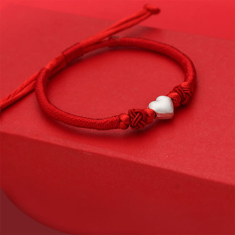 Buddha Stones Armband van 999 sterling zilver met 3D-hartontwerp en rood koordje. - image 4