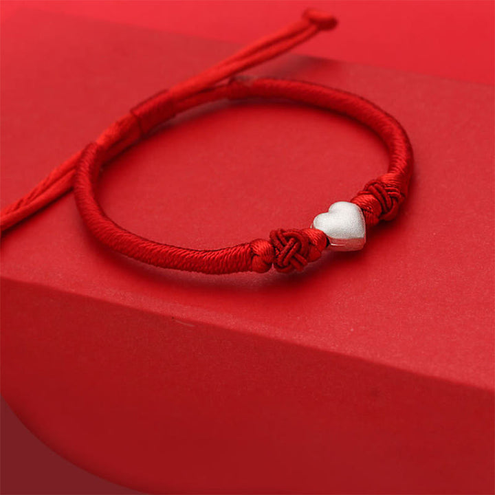 Buddha Stones Armband van 999 sterling zilver met 3D-hartontwerp en rood koordje. - image 4