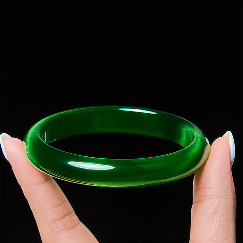Buddha Stones Dunne Mouwboord met groene kattenoogsteen voor stressvermindering en het bevorderen van welvaart . - Groene kattenoog (Zelfvertrouwen ♥ Rijkdom) - 64 mm - image 0