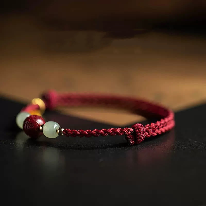 Buddha Stones Fu-teken Hetian jade kraal Om Mani Padme Hum Cinnaberrode koord Armband - image 1