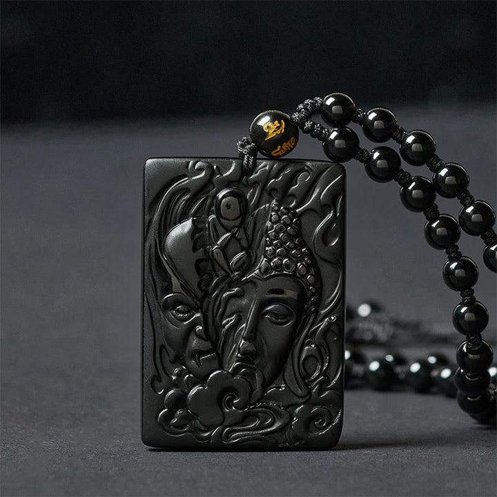 Buddha Stones Ketting met reliëf van half demon, half Boeddha, en van zwarte obsidiaan. - image 1