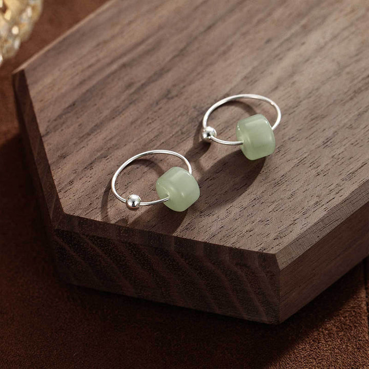 Buddha Stones Oorbellen van 925 sterling zilver met Hetian jade, symbool van voorspoed. - image 1
