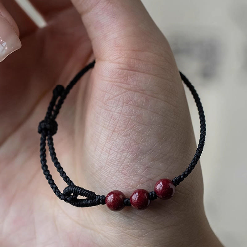 Buddha Stones Handgemaakte Armband van gevlochten touw met cinnaberkralen en een kalmerend effect. - image 10