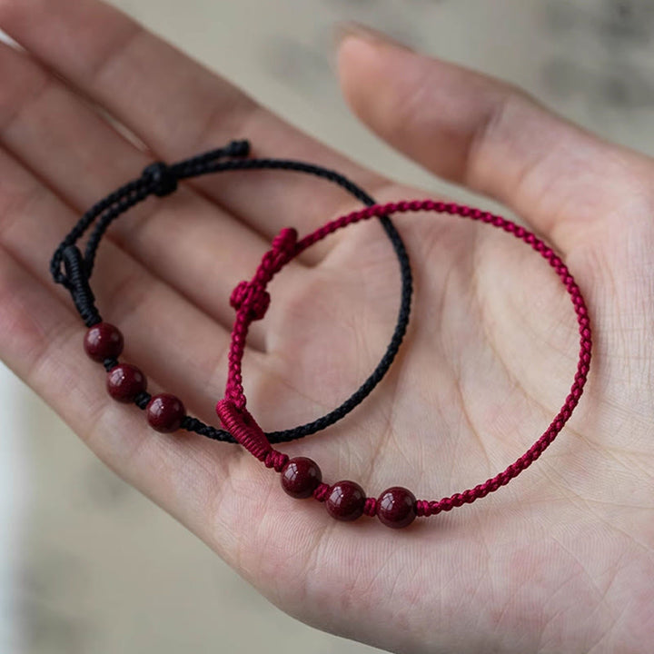 Buddha Stones Handgemaakte Armband van gevlochten touw met cinnaberkralen en een kalmerend effect. - image 15