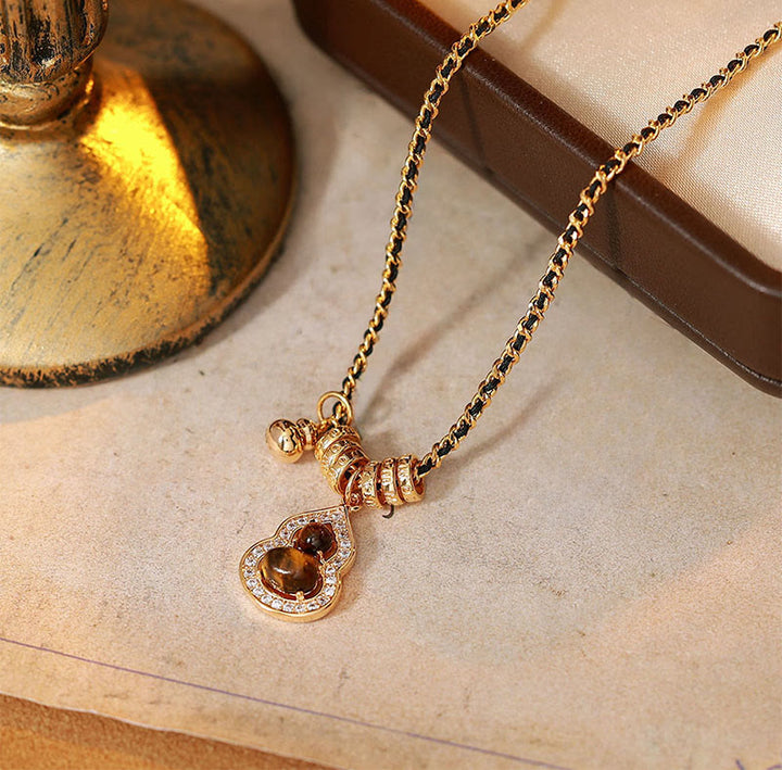Buddha Stones Ketting met dubbele kalebas en tijgeroogmotief, verguld met koper en goud. - image 1