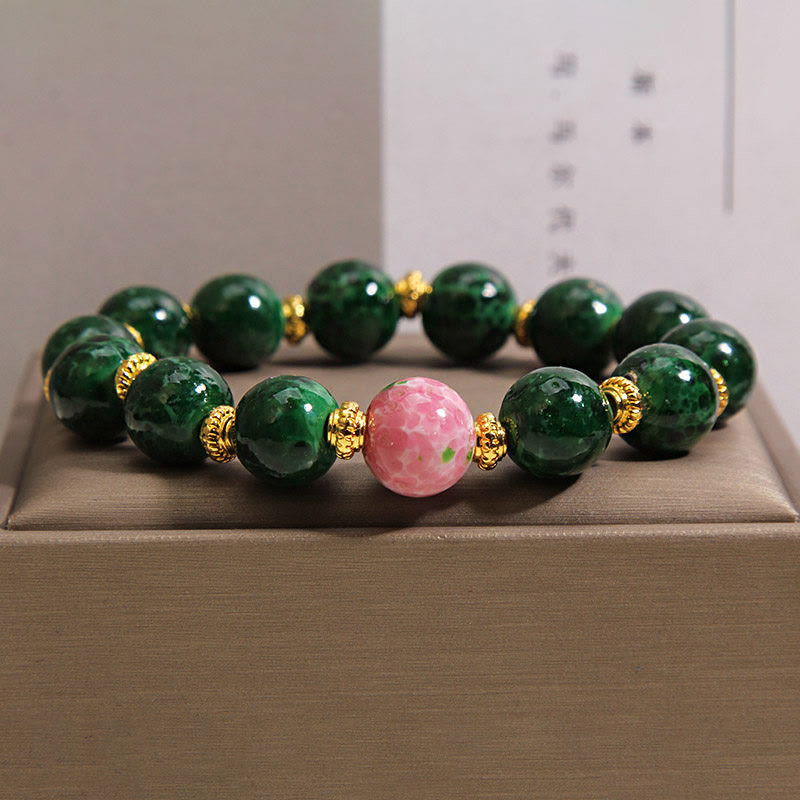 Buddha Stones Groene Liuli glazen Armband met zegeningen - Liuli Glass (Polsomtrek: 15-16 cm) - image 0