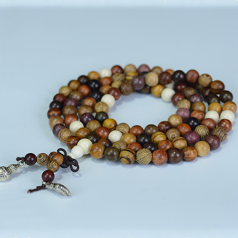 Buddha Stones Mala met 108 kralen in verschillende tinten, gemaakt van natuurlijk hout, voor een kalmerende en energieke ervaring. - image 1