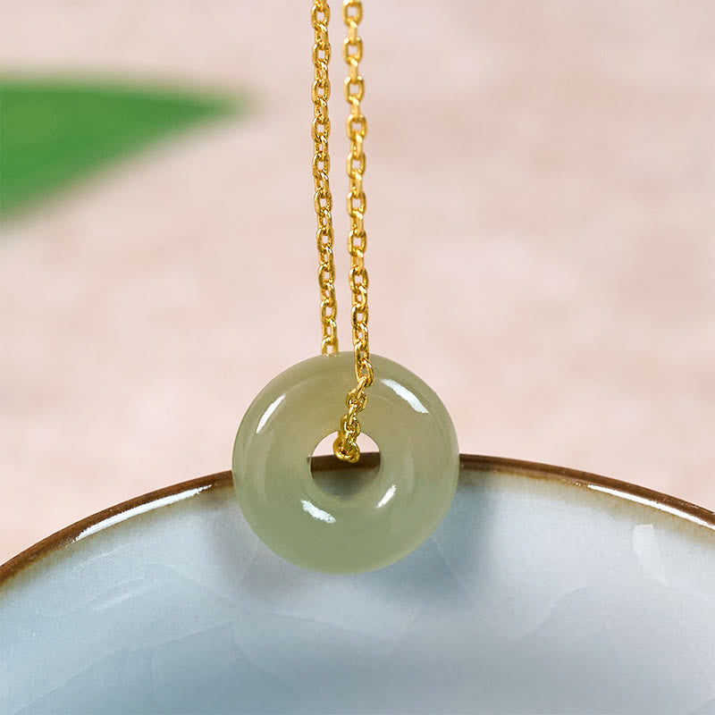 Buddha Stones Natuurlijke groene jade vredesgesp Ketting - Natuurlijke jade (kleur kan variëren) - Gouden koperen ketting - image 0