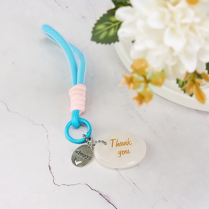 Buddha Stones Bedankcadeautjes: sleutelhanger met beschermend, wit kwartskristal en decoratie. - image 1
