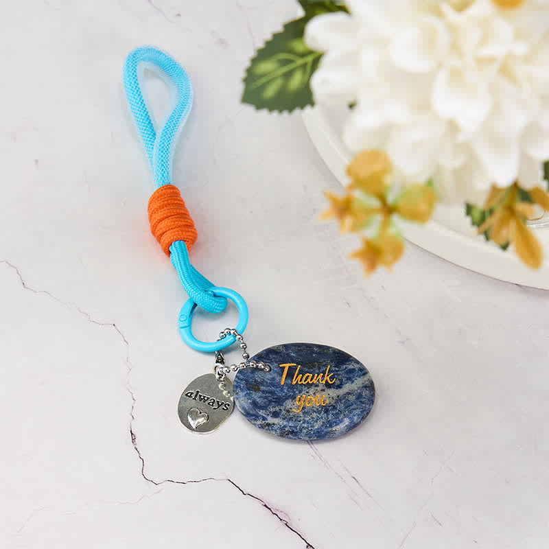 Buddha Stones Bedankcadeautjes: een sleutelhangertje van natuurlijk sodaliet dat rustgevend is en als decoratie kan dienen. - image 1