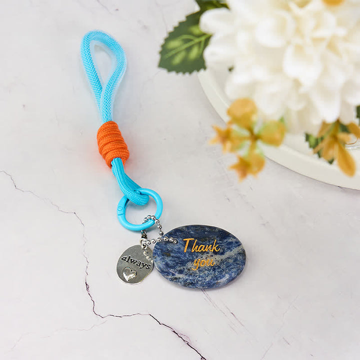 Buddha Stones Bedankcadeautjes: een sleutelhangertje van natuurlijk sodaliet dat rustgevend is en als decoratie kan dienen. - image 1