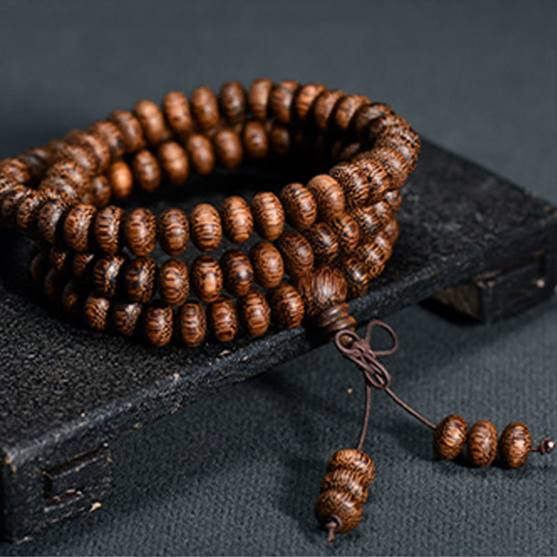 Buddha Stones Mala met 108 houten kralen met textuur voor een kalmerende energie - 6* 9mm*108 - image 0
