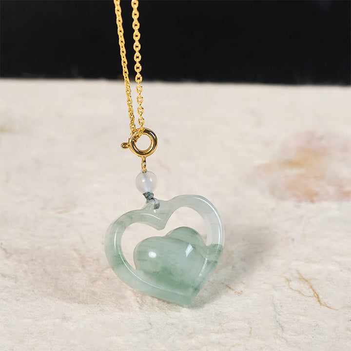 Buddha Stones Ketting van hol liefdeshart van jade met symbool voor overvloed. - image 1