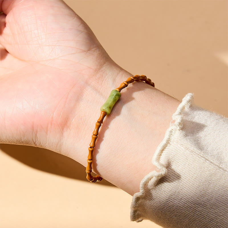 Buddha Stones Armband met natuurlijke olijfpit, peridot en bamboe design - image 5