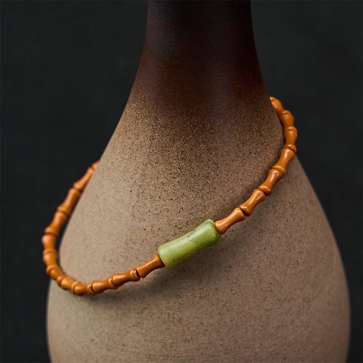 Buddha Stones Armband met natuurlijke olijfpit, peridot en bamboe design - Olijfpit (Polsomtrek 15-16 cm) - image 0