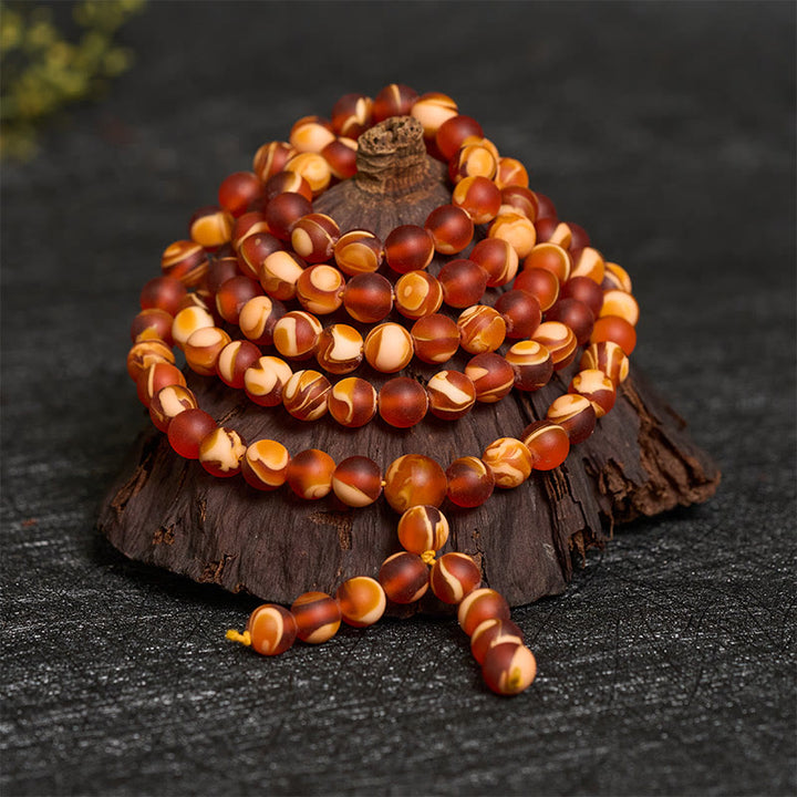 Buddha Stones Mala met 108 ronde Tibetaanse barnsteenkralen om angst te verlichten - image 2