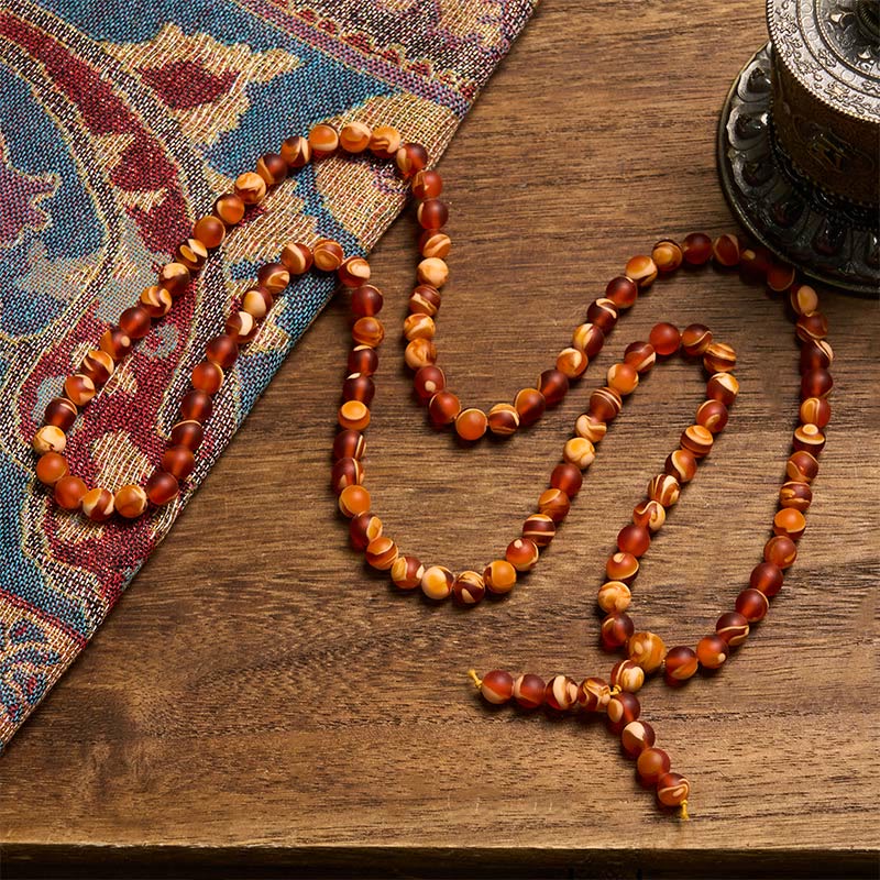 Buddha Stones Mala met 108 ronde Tibetaanse barnsteenkralen om angst te verlichten - image 1