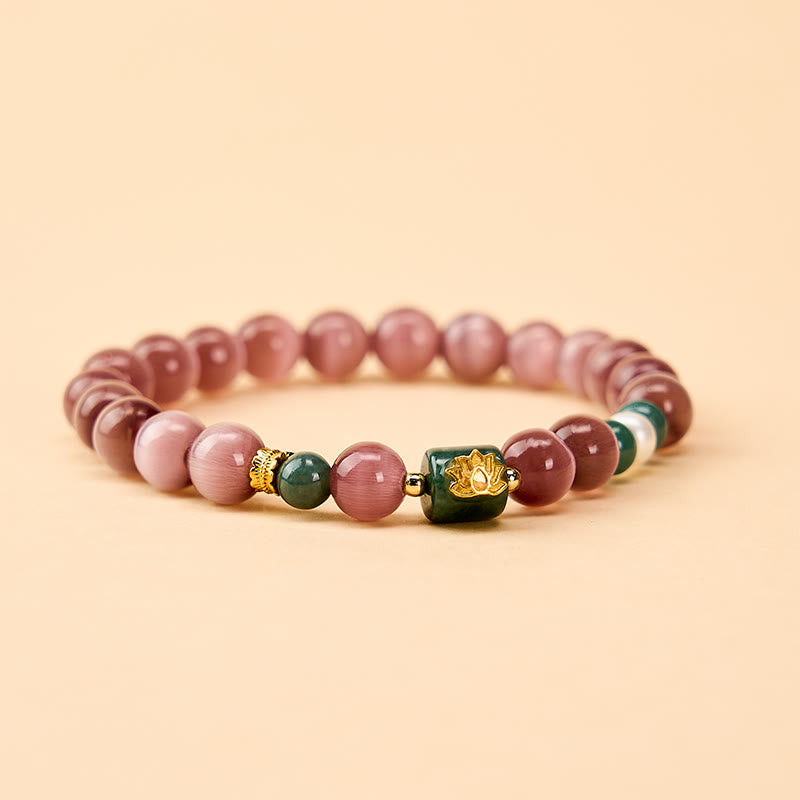 Buddha Stones Paarse Armband met kattenoog-lotussymbool, symbool voor verlichting. - image 1