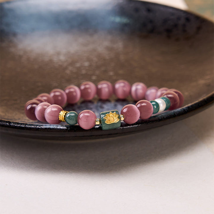 Buddha Stones Paarse Armband met kattenoog-lotussymbool, symbool voor verlichting. - image 3