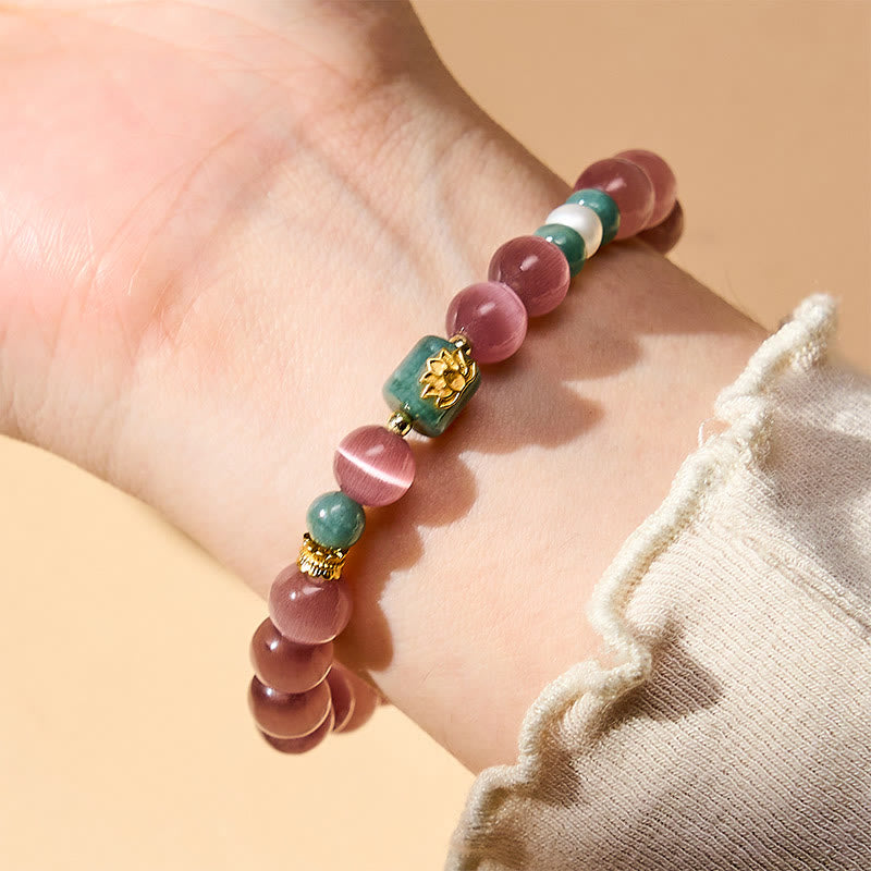 Buddha Stones Paarse Armband met kattenoog-lotussymbool, symbool voor verlichting. - image 2