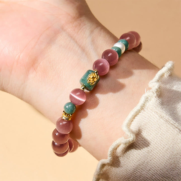 Buddha Stones Paarse Armband met kattenoog-lotussymbool, symbool voor verlichting. - image 2