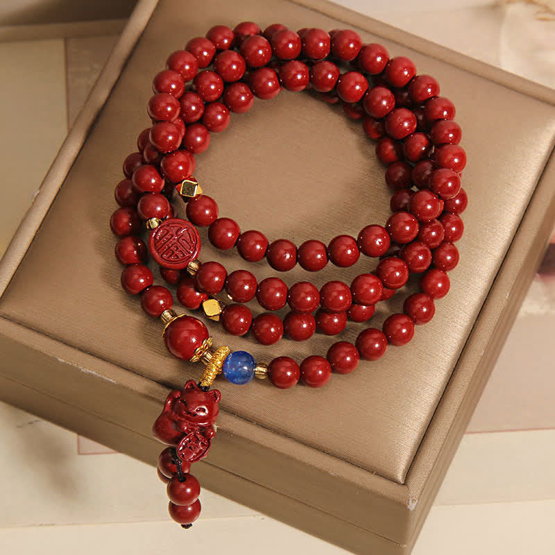 Buddha Stones Tibetaanse mala met 108 kralen, cinnaberkleurige gelukskat en Fu-teken . - image 1