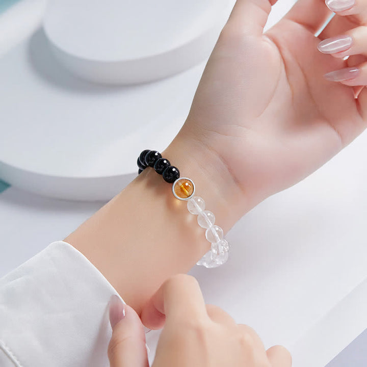 Buddha Stones Armband van helder kwarts en zwarte obsidiaan - image 3