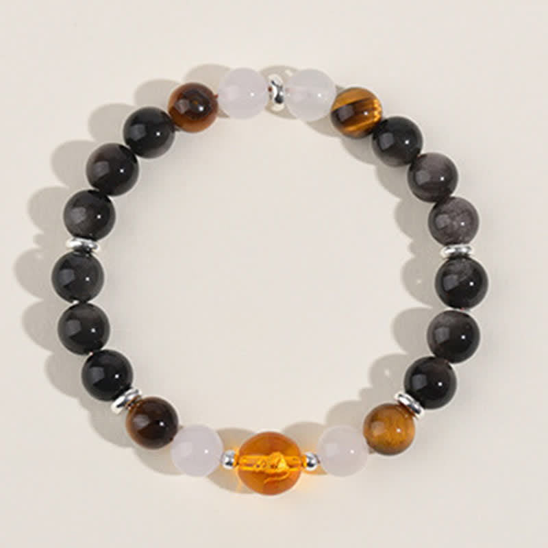 Buddha Stones Natuurlijke kristallen, zilverglanzende obsidiaan, Chinese dierenriem Armband - image 1