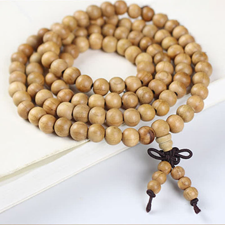 Buddha Stones Handgepolijste, geknoopte mala met 108 kralen van perzikhout . - image 7
