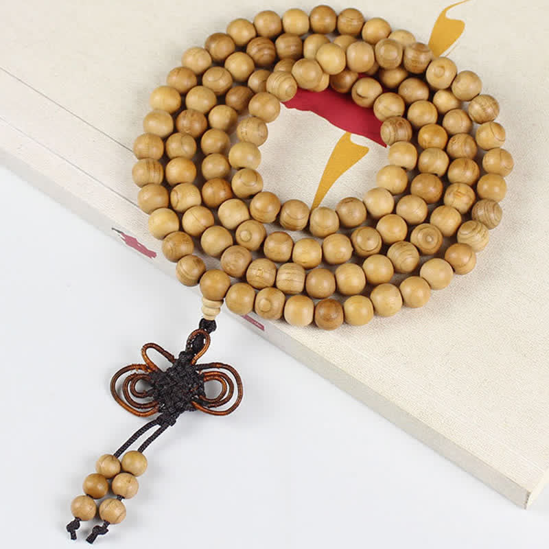Buddha Stones Handgepolijste, geknoopte mala met 108 kralen van perzikhout . - image 8