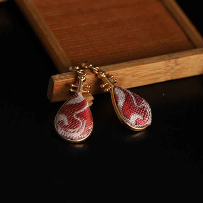 Buddha Stones Song Brocade Witte Patronen Pipa-vormig Ontwerp Harmonie Druppelvormige Oorbellen - image 1