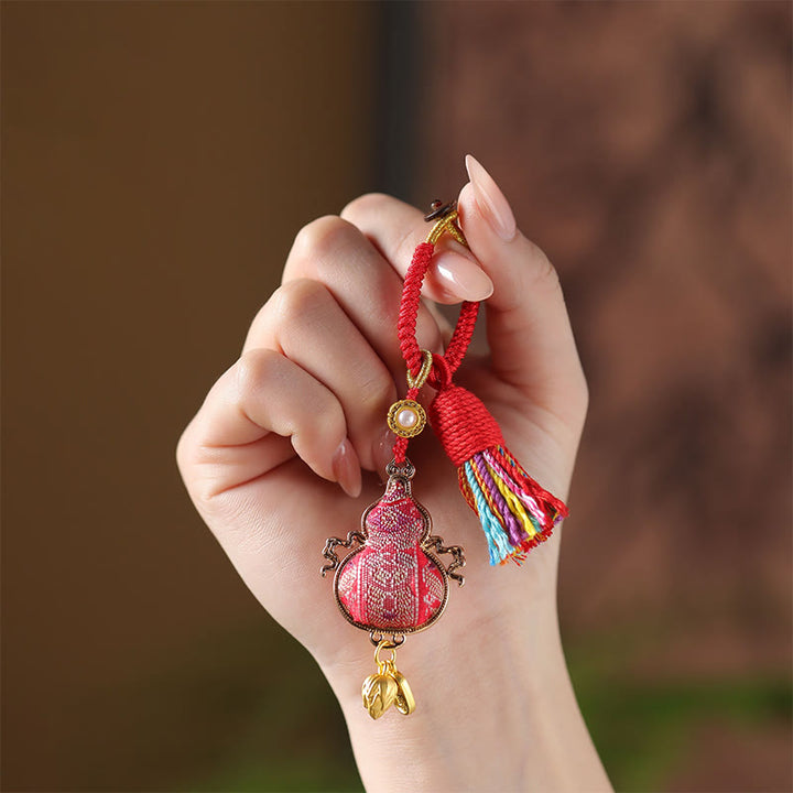Buddha Stones Sleutelhanger met brokaatmotief en gelukssymbool - image 5