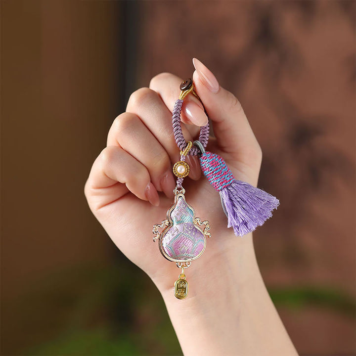 Buddha Stones Sleutelhanger met brokaatmotief en gelukssymbool - image 2